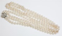 Lot 452 - A two row uniform cultured pearl necklace