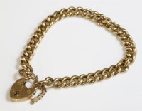 Lot 391 - An Edwardian 15ct gold hollow curb link bracelet