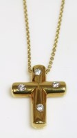 Lot 489 - A gold and diamond set Tiffany & Co. 'Etoile' cross pendant