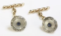 Lot 373 - A pair of Continental Art Deco sapphire and mother-of-pearl gold cufflinks