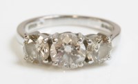 Lot 513 - An 18ct white gold three stone diamond ring
