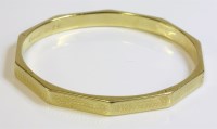 Lot 334 - A 15ct gold Art Deco slave bangle of decagonal form