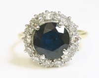 Lot 444 - A sapphire and diamond circular cluster ring