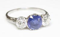 Lot 406 - An early 20th century sapphire and diamond three stone ring