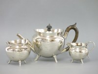 Lot 163 - A silver three piece teaset