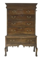 Lot 404 - An oak chest on stand