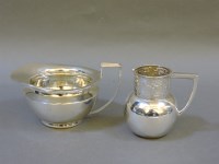 Lot 206 - Two silver cream jugs