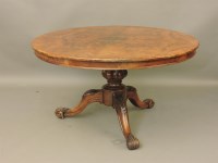 Lot 594 - A Victorian walnut and mahogany centre table