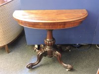 Lot 633 - A Victorian mahogany demi lune card table