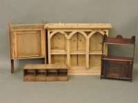 Lot 659 - A pine arcaded hanging wall shelf
