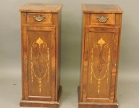 Lot 697 - A pair of inlaid bedside cupboards