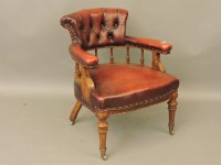 Lot 739 - A Victorian oak and red leather desk chair