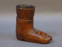 Lot 385 - A hardwood carved boot