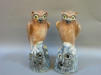 Lot 317 - A pair of Chinese pottery owls