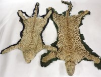 Lot 382 - Two stuffed head leopard rugs