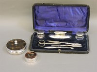Lot 175 - A silver part manicure set