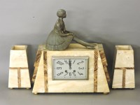 Lot 284 - An Art Deco marble mantel clock garniture