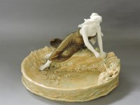 Lot 351 - An Art Nouveau pottery lily pond with lady and birds