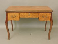 Lot 675 - A 20th century French style writing desk