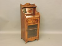 Lot 646 - A late 19th century rosewood and inlaid music cabinet