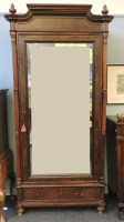 Lot 636 - A 19th century French rosewood armoire