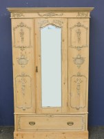 Lot 653 - A pine mirrored wardrobe