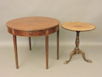 Lot 672 - A George III mahogany demi lune tea table