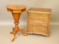 Lot 755 - A Victorian walnut octagonal top trumpet shaped sewing table