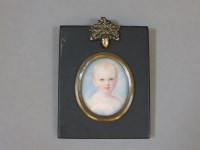 Lot 142 - A mid 19th century miniature of a young child