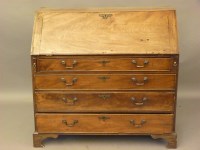 Lot 698 - A large George III mahogany bureau