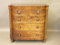 Lot 665 - A 19th century mahogany chest of two short and three long drawers