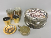Lot 273 - A Middle Eastern brass powder flask