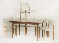 Lot 450 - A Danish teak draw-leaf dining table