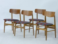 Lot 454 - A set of four Danish teak dining chairs