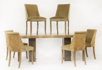 Lot 220 - An Art Deco walnut dining room suite
