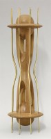 Lot 478 - A walnut and brass sculpture