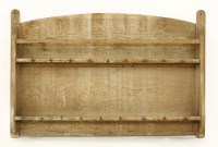 Lot 43 - An Arts and Crafts oak plate rack