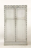 Lot 143 - A painted wardrobe