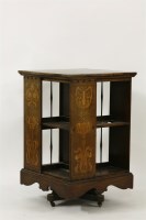Lot 76 - A Shapland & Petter inlaid oak revolving bookcase