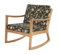 Lot 525 - A teak rocking chair