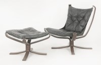 Lot 461 - A Falcon armchair and footstool
