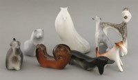 Lot 431 - Eight porcelain Ćmielów dogs