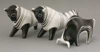 Lot 435 - Three porcelain Ćmielów bulls