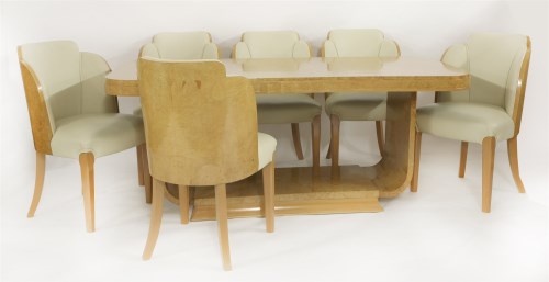 Lot 282 - An Art Deco burr walnut dining table