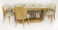 Lot 282 - An Art Deco burr walnut dining table