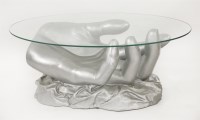 Lot 494 - A fibreglass 'hand' coffee table