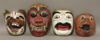 Lot 515 - Four Indian(?) carved wood theatre masks