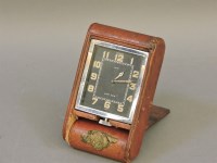 Lot 194 - An Asprey leather cased travelling clock