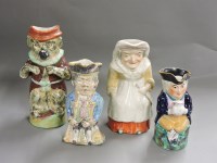 Lot 336 - Four 19th century Staffordshire Toby jugs