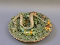 Lot 376 - A Portuguese Palissy style plate